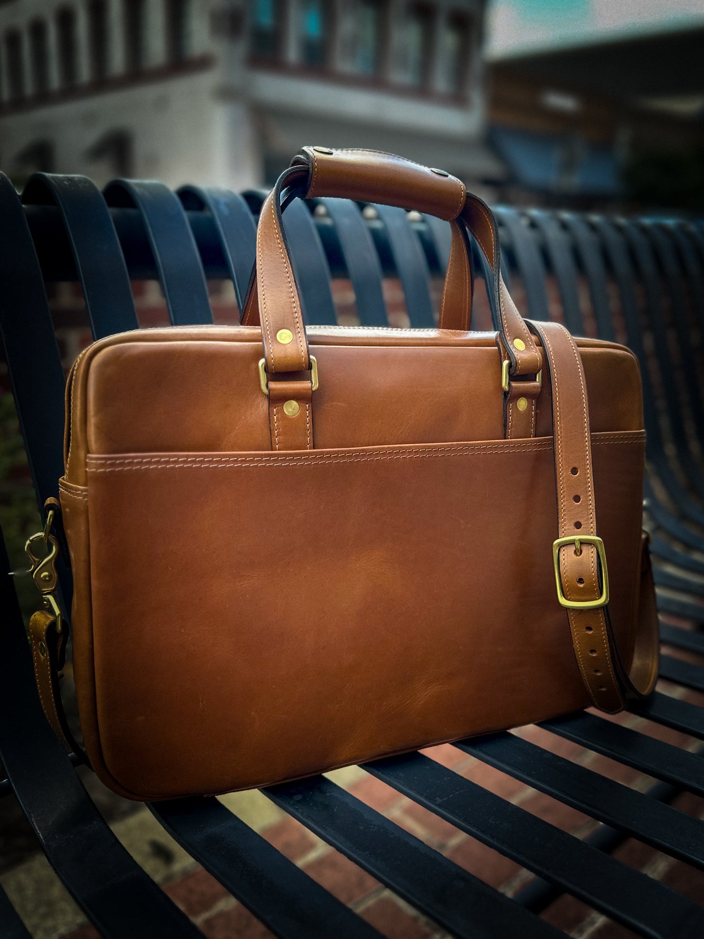 Rear pocket view of handcrafted Vachetta leather briefcase