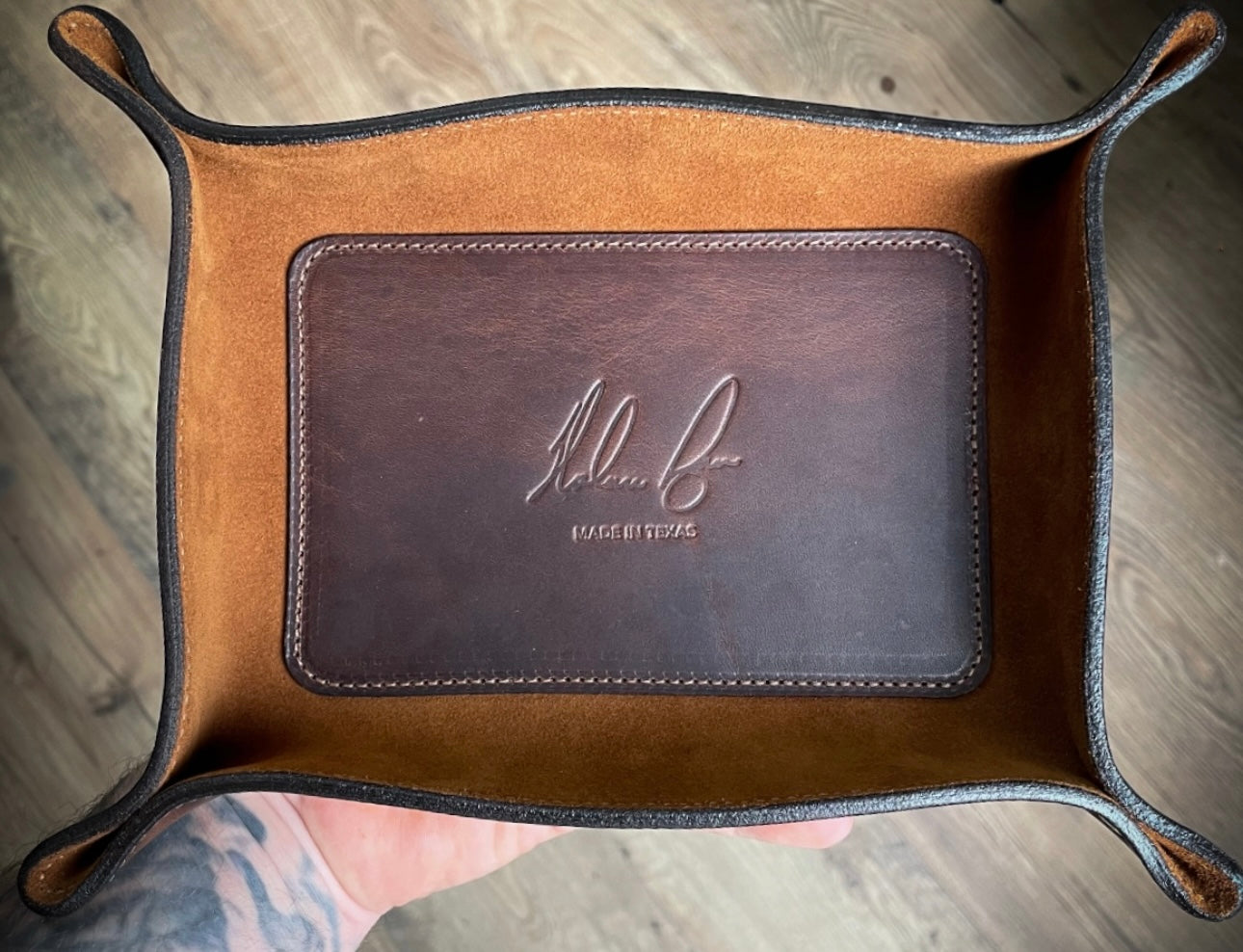 Premium leather valet tray by Gunnar & Co., featuring a suede interior and custom stamped logo, handcrafted in Texas.
