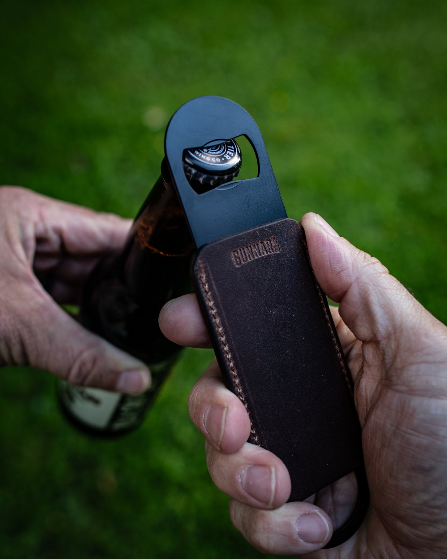 Leather wrapped bottle opener